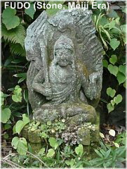 Fudo Myo-o - Stone statue in private garden in Kamakura