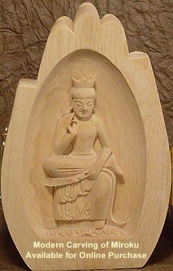 Modern Wood Carving of Miroku -- available for online purchase at www.buddhist-artwork.com