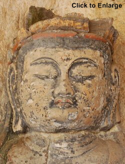 Usuki, Oita Prefecture. The famous 12th-century head of Dainichi Nyorai carved into the rock face.