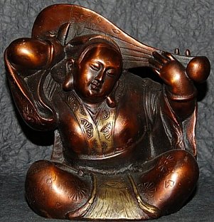 Modern metal statue of Benzaiten playing a lute