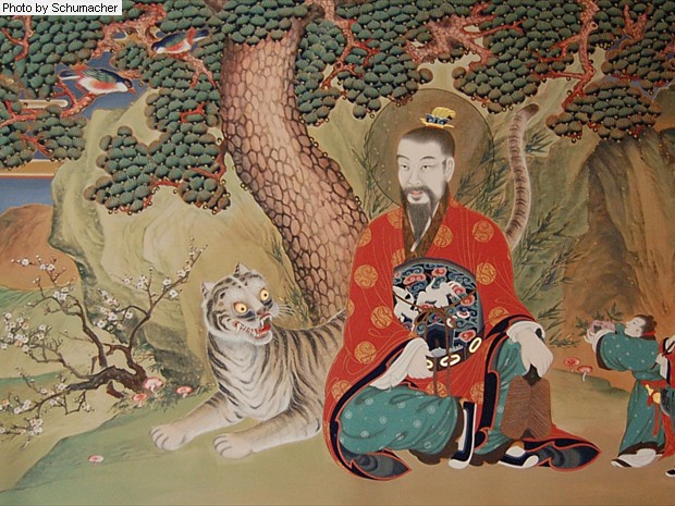 Painting of Tiger & the Mountain Spirit at Seokjongsa Temple. The Mountain Spirit is one of three spirits worshiped widely in Korea. (1) Mountain Spirit, who governs material wealth and shown with a tiger; (2) Lord of the Big Dipper, who governs human fortune & longevity; and (3) Dokseong, an enlightened hermit who blesses the people. The three also represent (1) Shamanism, (2) Taoism, and (3) Buddhism respectively. 