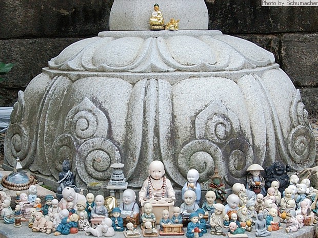 Votive objects at Donghaksa Temple, likely for Kṣitigarbha (Krn. = Jijang 지장, Jp. = Jizō, Chn. = Dìzàng), the guardian of souls in hell, and patron ofchildren and expectant mothers.