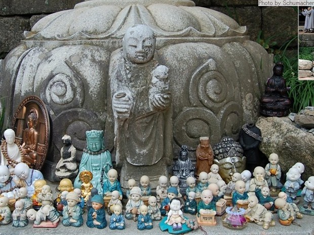 Votive objects for Kṣitigarbha (Krn. = Jijang 지장, Jp. = Jizō, Chn. = Dìzàng), the guardian of souls in hell, and patron ofchildren and expectant mothers. Donghaksa Temple, Korea.