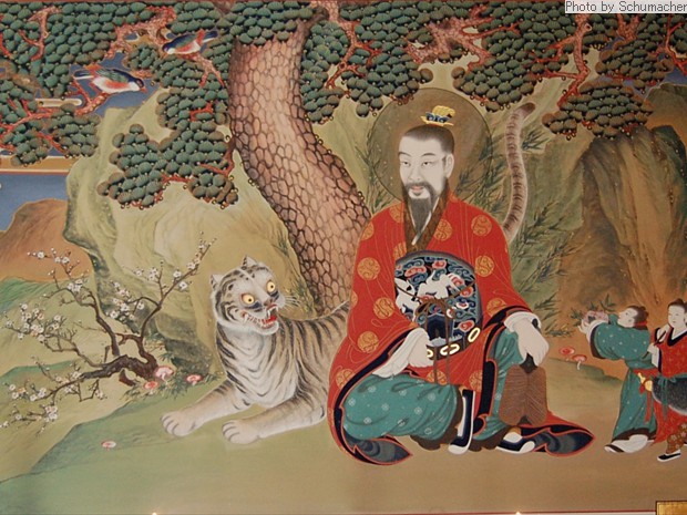 Painting, Seokjongsa Temple, Mountain Spirit and Tige. One of three spirits worshiped widely in Korea. (1) Mountain Spirit, who governs material wealth and is accompanied by a tiger; (2) Lord of the Seven Stars, or Big Dipper, who governs human fortune & longevity; (3) Dokseong, an enlightened hermit who blesses the people. The three also represent (1) Shamanism, (2) Taoism, and (3) Buddhism respectively. 