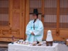 Man serving refreshments at the Asian Art Museum, Seoul, Korea.