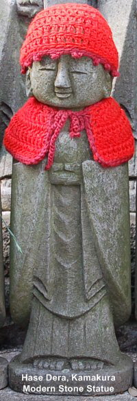 Hase Dera, Kamakura - Stone Statue of Jizo Decked in Red Clothing