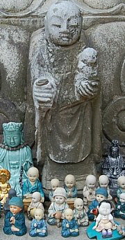 Votive objects surrounding Ksitigarbha at Donghaksa Temple