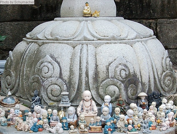 Votive statues at Donghaksa, likely for Kitigarbha (K. = Jijang, J. = Jizō, C. = Dìzàng), guardian of souls in hell, and a patron of children and expectant mothers.