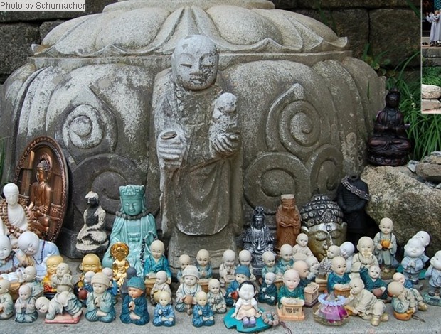 Votive objects for Kitigarbha (Krn. = Jijang 지장, Jp. = Jizō, Chn. = Dìzàng), the guardian of souls in hell, and a patron of children and expectant mothers. Donghaksa Temple, Korea.